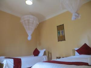 Postel nebo postele na pokoji v ubytování Lycklama Guesthouse + 5 fotografií