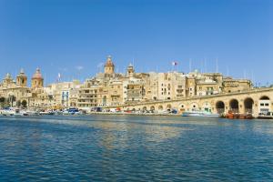 a view of a city from a body of water at Gozitan Farmhouse Pool & Jacuzzi - PP 2 in Il-Wilġa