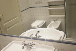 Koupelna v ubytování Hotel RossoVino Milano