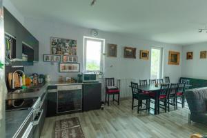 a kitchen and dining room with a table and chairs at local tax 3 Eur guest for night in Semmering