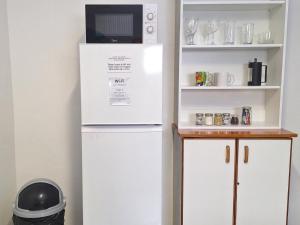 Kuchyň nebo kuchyňský kout v ubytování High Level Self Catering Agulhas