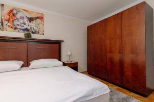 Postel nebo postele na pokoji v ubytování Apartments TGM 11
