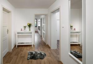 Postel nebo postele na pokoji v ubytování Apartmány Myslivna