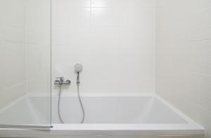 Koupelna v ubytování Apartmány Myslivna