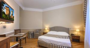 A bed or beds in a room at Albergo Reggio