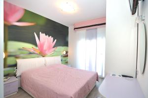 Postel nebo postele na pokoji v ubytování Hotel Oliver