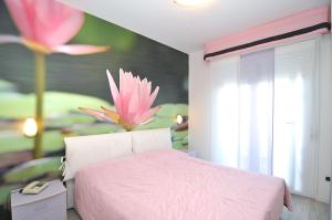 Postel nebo postele na pokoji v ubytování Hotel Oliver