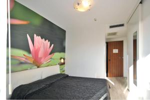Postel nebo postele na pokoji v ubytování Hotel Oliver