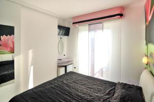Postel nebo postele na pokoji v ubytování Hotel Oliver