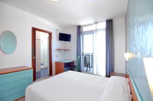 Postel nebo postele na pokoji v ubytování Hotel Oliver