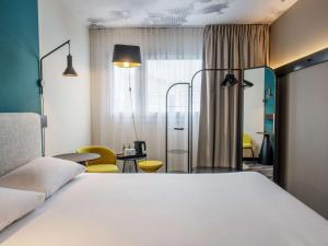 Postel nebo postele na pokoji v ubytování ibis Warszawa Centrum