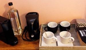Set per la preparazione di tè e caffè presso B&B Au Coq en Pate