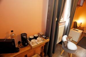 Set per la preparazione di tè e caffè presso B&B Au Coq en Pate