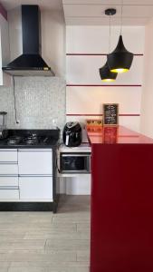 Køkken eller tekøkken på Bella praia bloco E 42