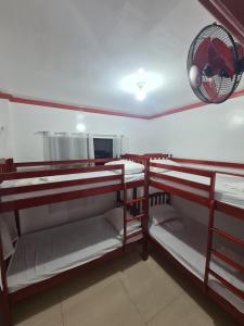 Postel nebo postele na pokoji v ubytování Rotunda Inn home stay