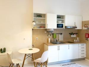 Küche/Küchenzeile in der Unterkunft Alcântara Studio 15