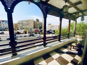 a view of a city from a balcony of a building at Friends Oasis in Aqaba