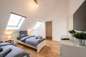 Un ou plusieurs lits dans un hébergement de l'établissement Maisonette-Wohnung in Griesheim!