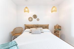 Postel nebo postele na pokoji v ubytování Blau d'Aro - Encanto y Relax en Platja d'Aro - Vistas al Mar y Parking privado