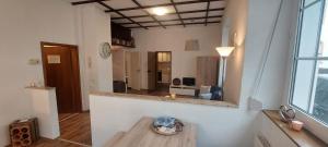 a living room with a table in a room at Rheingold inklusive einer Flasche Sekt in Koblenz