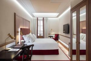 Posteľ alebo postele v izbe v ubytovaní Palacio Solecio, a Small Luxury Hotel of the World