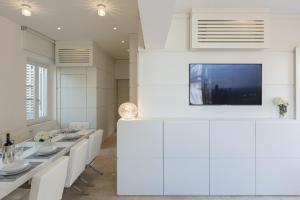 Μια τηλεόραση ή/και κέντρο ψυχαγωγίας στο Amazing 3 Levels Penthouse Piazza Venezia