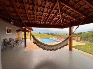 Swimmingpoolen hos eller tæt på Sítio Santo Antônio