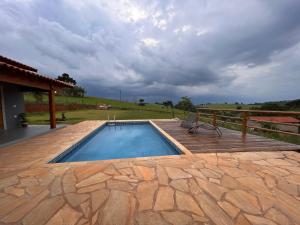Swimmingpoolen hos eller tæt på Sítio Santo Antônio + 13 billeder