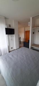 Ένα ή περισσότερα κρεβάτια σε δωμάτιο στο Alojamiento MAR