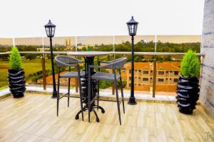 TJ's Boutique Hotel的阳台或露台
