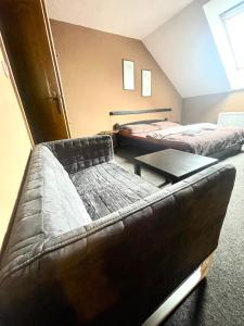 Postel nebo postele na pokoji v ubytování Penzion a restaurace U Nováků