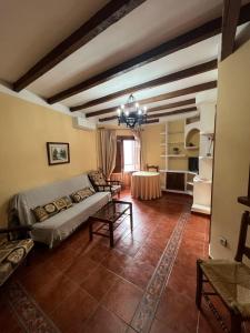 A seating area at Apartamentos Turísticos La Posada