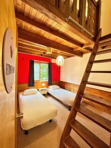 Postel nebo postele na pokoji v ubytování Moment Chalet Hakuba