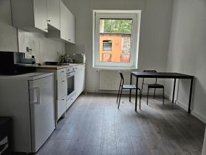 O bucătărie sau chicinetă la Ideale Unterkunft für Geschäftsreisende, Studenten, Monteure in Essen