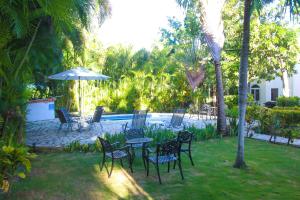 Apartamento BOUTIQUE con encanto en Juan Dolio-Metro Country Club-CON PISCINA, SEGURIDAD PRIVADA, ENERGIA 24-7, CAMPO DE GOLF Y TENIS室外花園