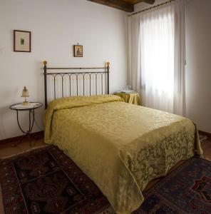 Säng eller sängar i ett rum på Agriturismo Da Ninoti