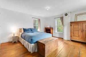 Postel nebo postele na pokoji v ubytování Maplewood Haven