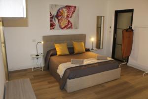 Ένα ή περισσότερα κρεβάτια σε δωμάτιο στο HOME LUXURY PARIOLI