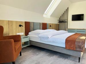 En eller flere senge i et værelse på Csipetnyi Csobbanás Vendégház