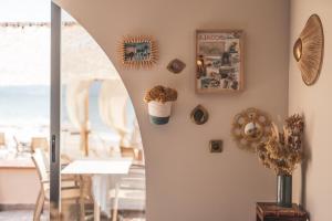 a dining room with a dining table and a dining roomiasm at Palm Beach in Ajaccio