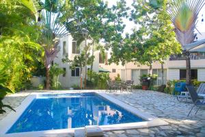 Apartamento BOUTIQUE con encanto en Juan Dolio-Metro Country Club-CON PISCINA, SEGURIDAD PRIVADA, ENERGIA 24-7, CAMPO DE GOLF Y TENIS游泳池或附近泳池
