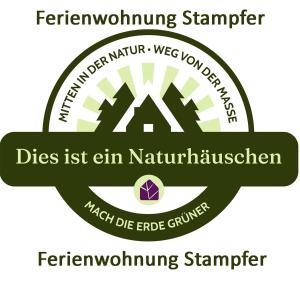 a logo for the deriving stamper dies est en nautilus at Ferienwohnung Stampfer in Gnesau