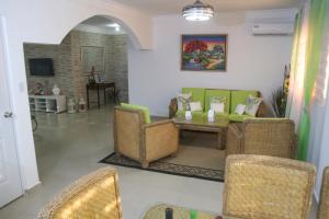Apartamento BOUTIQUE con encanto en Juan Dolio-Metro Country Club-CON PISCINA, SEGURIDAD PRIVADA, ENERGIA 24-7, CAMPO DE GOLF Y TENIS休息區