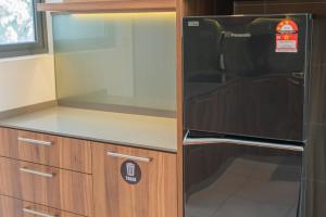Kuchyň nebo kuchyňský kout v ubytování Ipoh Tambun Sunway Onsen Suite 3R2B Maya