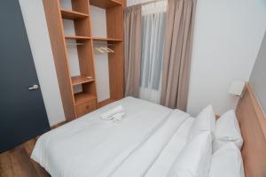 Postel nebo postele na pokoji v ubytování Ipoh Tambun Sunway Onsen Suite 3R2B Maya