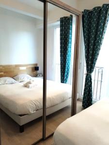 Postel nebo postele na pokoji v ubytování Le Palais -Idéal Couple- Terrasse Hypercentre