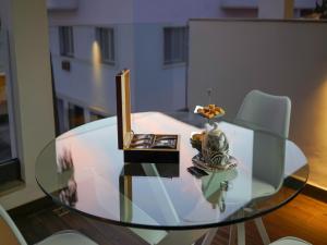 Posezení v ubytování Petit Palace Suites Hotel