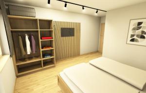 Postel nebo postele na pokoji v ubytování WOLF Apartments Padaun
