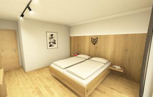 Postel nebo postele na pokoji v ubytování WOLF Apartments Padaun