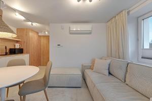 Ruang duduk di Wydma by Grand Apartments